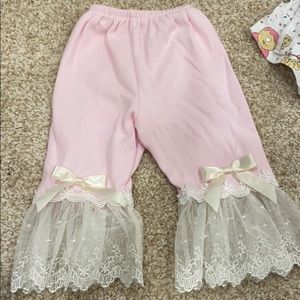 Pink pants with bow and lace detail
